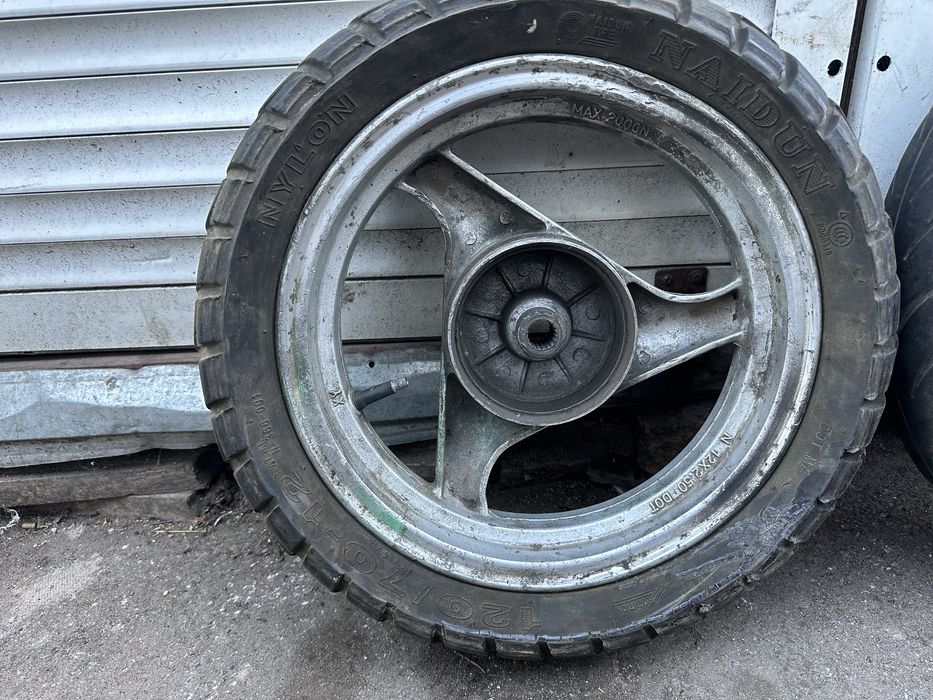 Колесо скутер 120/70-12 (19шлицов)