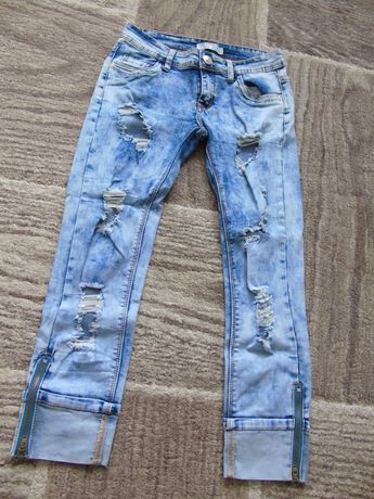 spodnie jeansy 3\4 z dziurami rybaczki