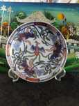 Prato porcelana sec.xix., peça com Fênix em relevo,