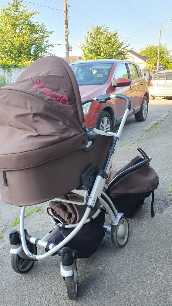 Дитяча каляска з автокріслом