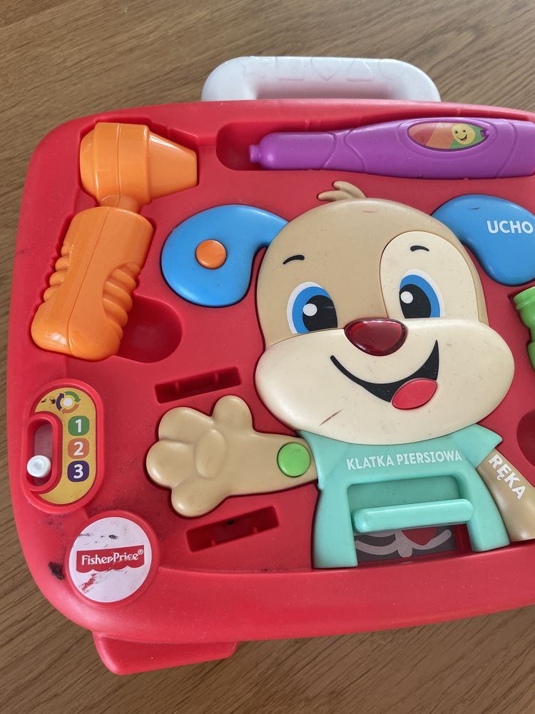 Grajaca zabawka fisher price szczeniaczek u Lekarz