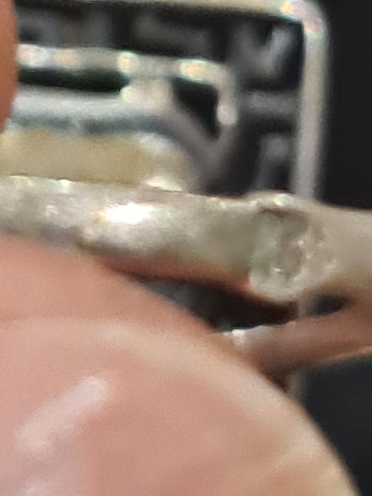 Srebrny pierścionek z  zielonym oczkiem