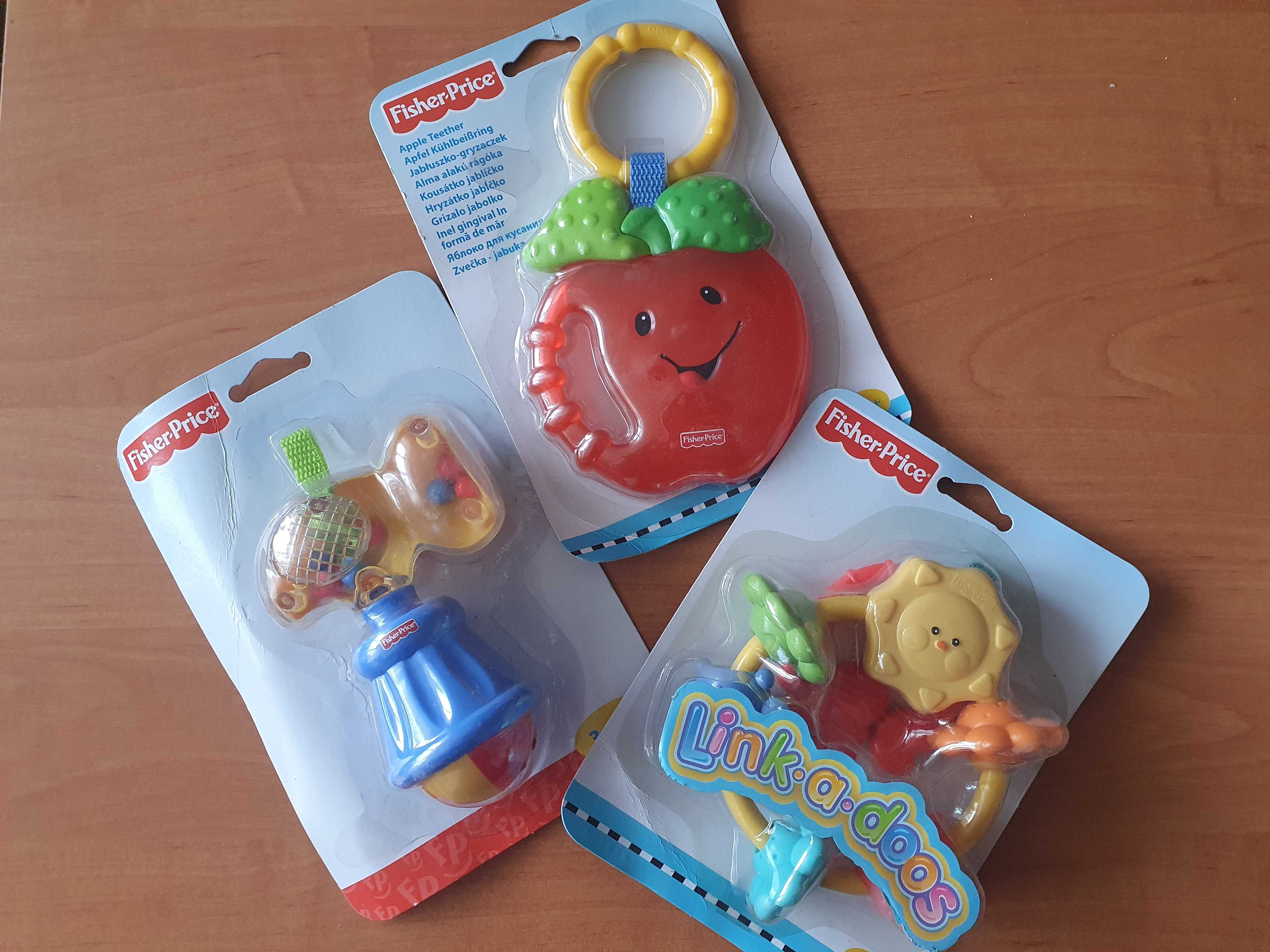 Fisher price брязкальця