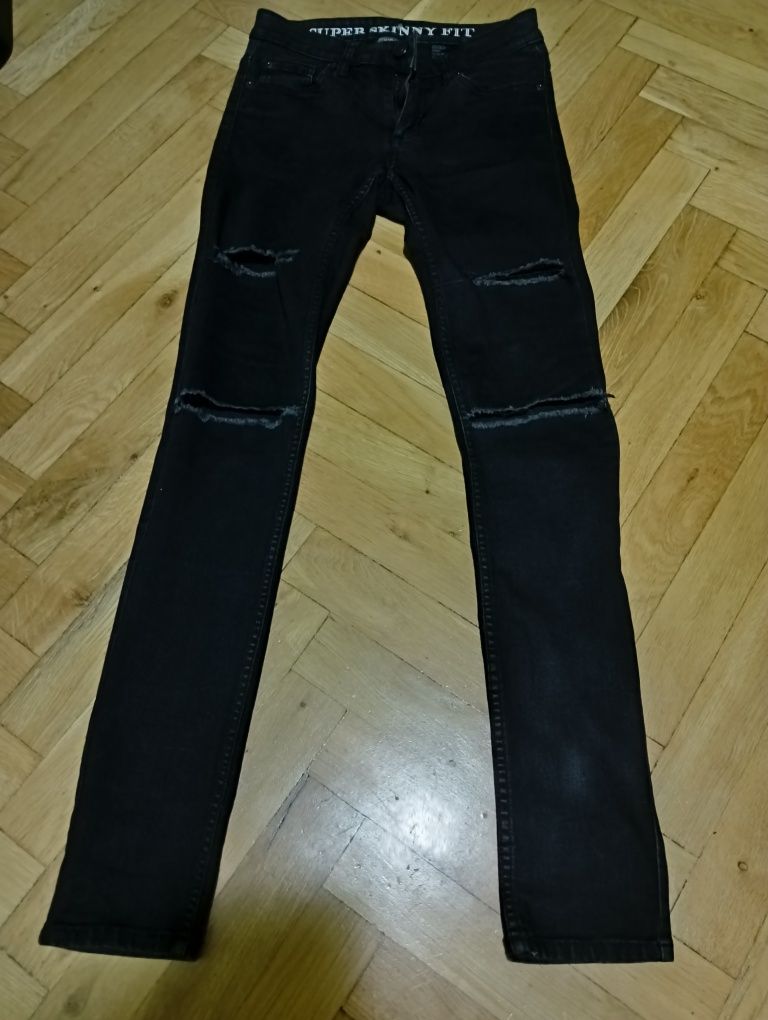 Spodnie jeansowe z dziurami H&M rozmiar M