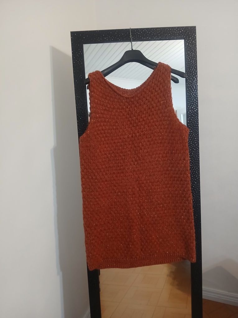 Colete ou poderá ser vestido