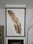 Quadro com pena dourada elegante