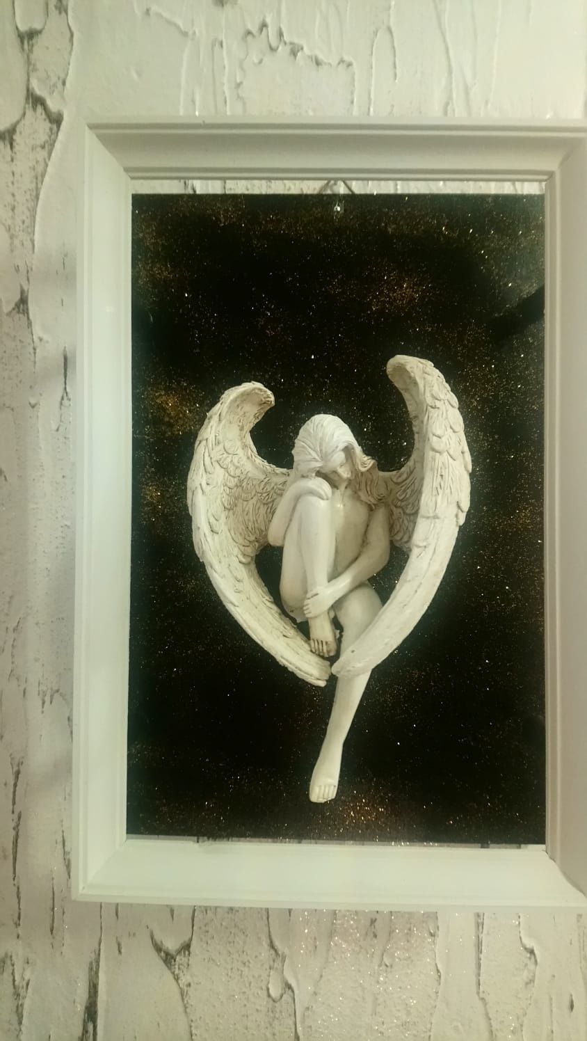 Figurka anioła w ramce