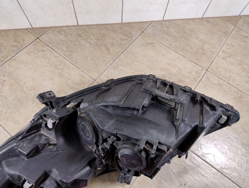 Renault grand scenic 3 lampa prawy przód uszkodzone mocowania Europa