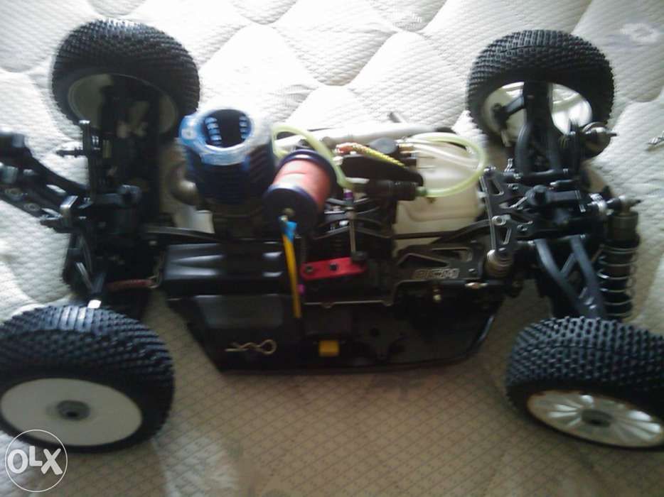 Carro telecomandado rc 1.8 tt ocm kaos dt - 19 a gasolina