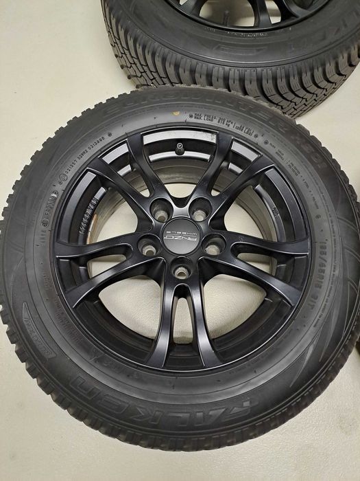 Czarne alufelgi Anzio 5x114.3 i opony zimowe Falken 195/65R15 91T