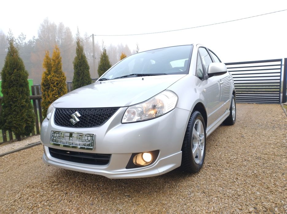 Suzuki SX4 Sedan 1.6 16V 107 KM Klima Alu 125 tyś KM Oryginał