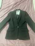 Blazer preto de marca Nacional