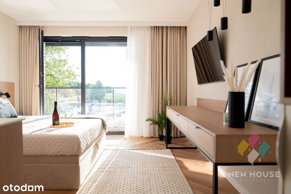 Apartament na Szlaku Wielkich Jezior z ogródkiem