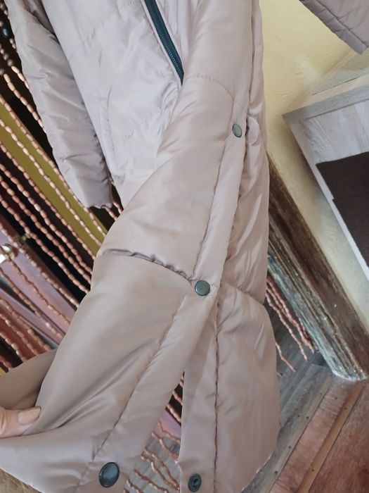 Пуховик новый,размер 46на 48 ,шикарный теплый,согреет в холодные зимни