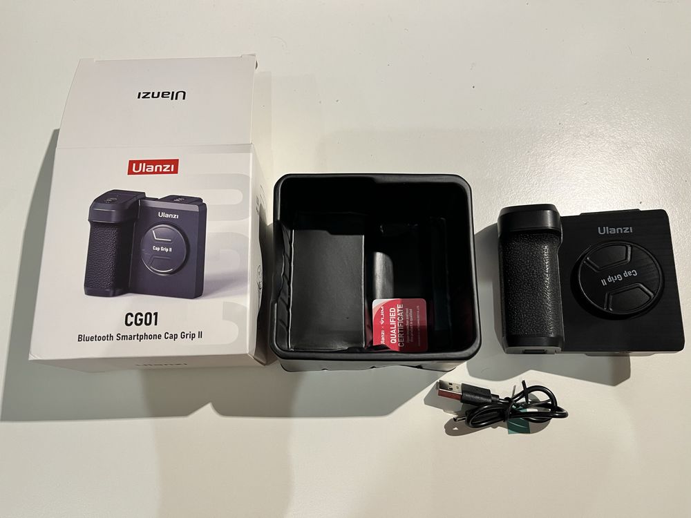 Pega de telemóvel, com controlo Bluetooth