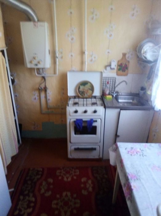 Продам половину будинка в районі Першої міської лікарні