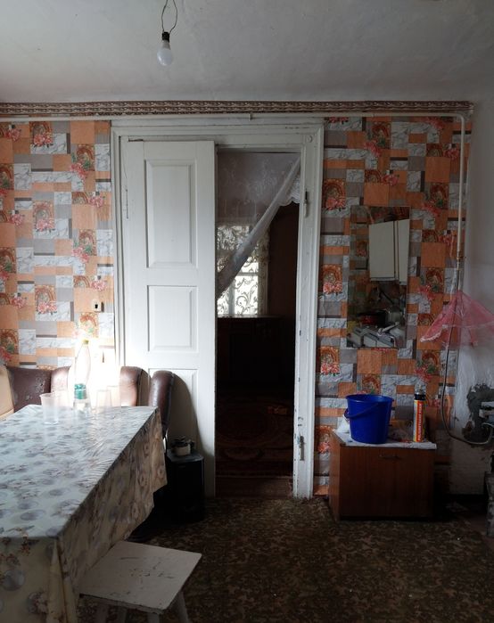 Будинок- земельна ділянка