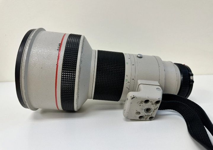 Canon FD 300mm f:2,8 L com mala e parasol