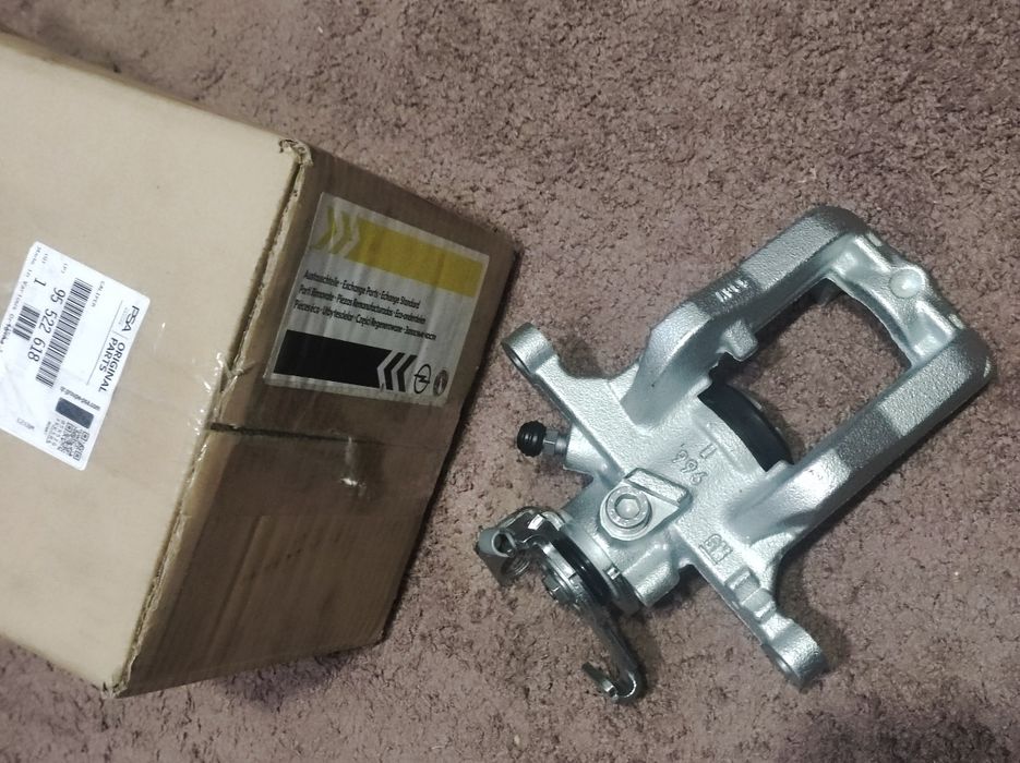 Тормозний задній правий супорт Опель Астра J Зафіра С 95522618