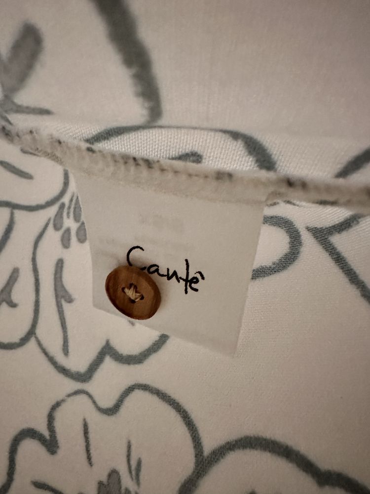 Camisa da marca CANTÊ , comprida que da como tunica de praia