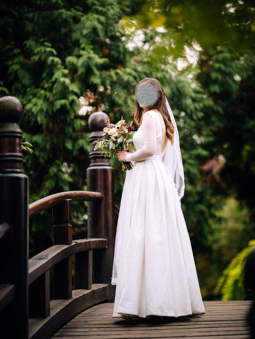 Elegancka, klasyczna suknia ślubna z kieszeniami. 34/36