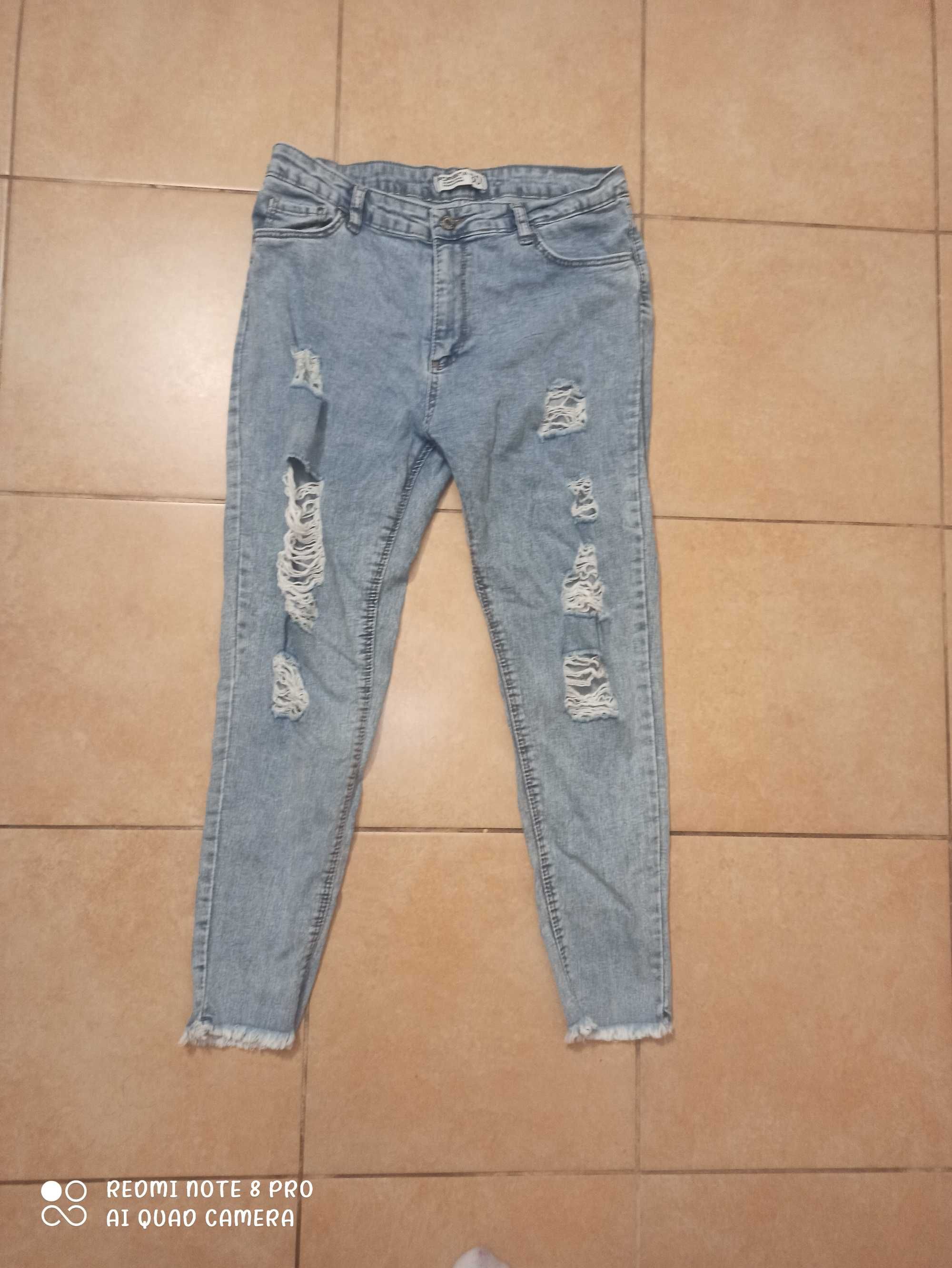 jeansy jasne damskie  z dziurami r.30