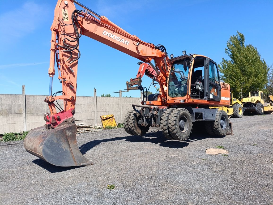 Koparka kołowa doosan 160 jak cat atlas doosan 140