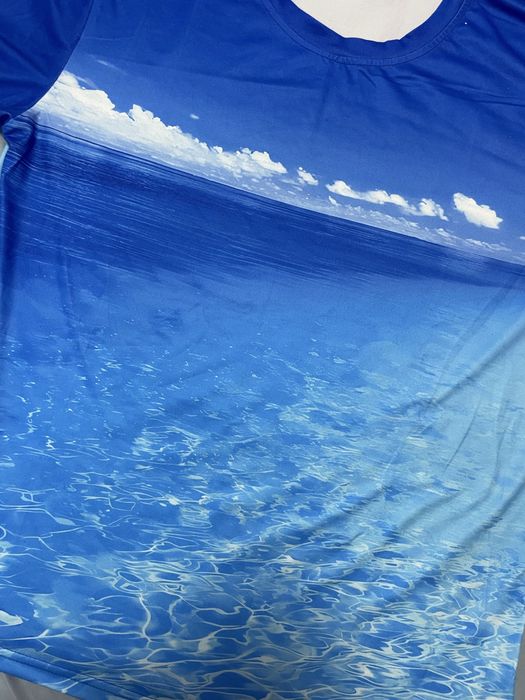 Niebieska dwustronna koszulka z motywem oceanu