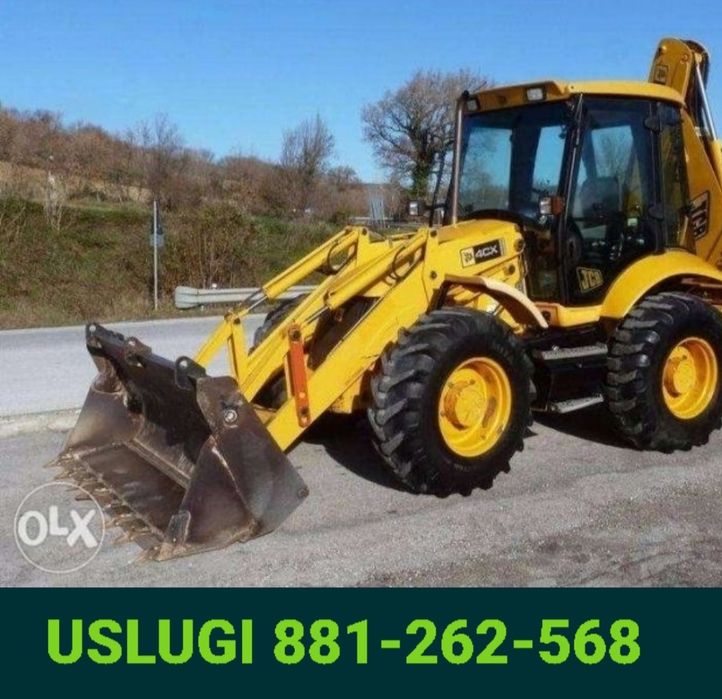 Uslugi.  Koparko ladowarka.  Koparka kolowa Mecalac