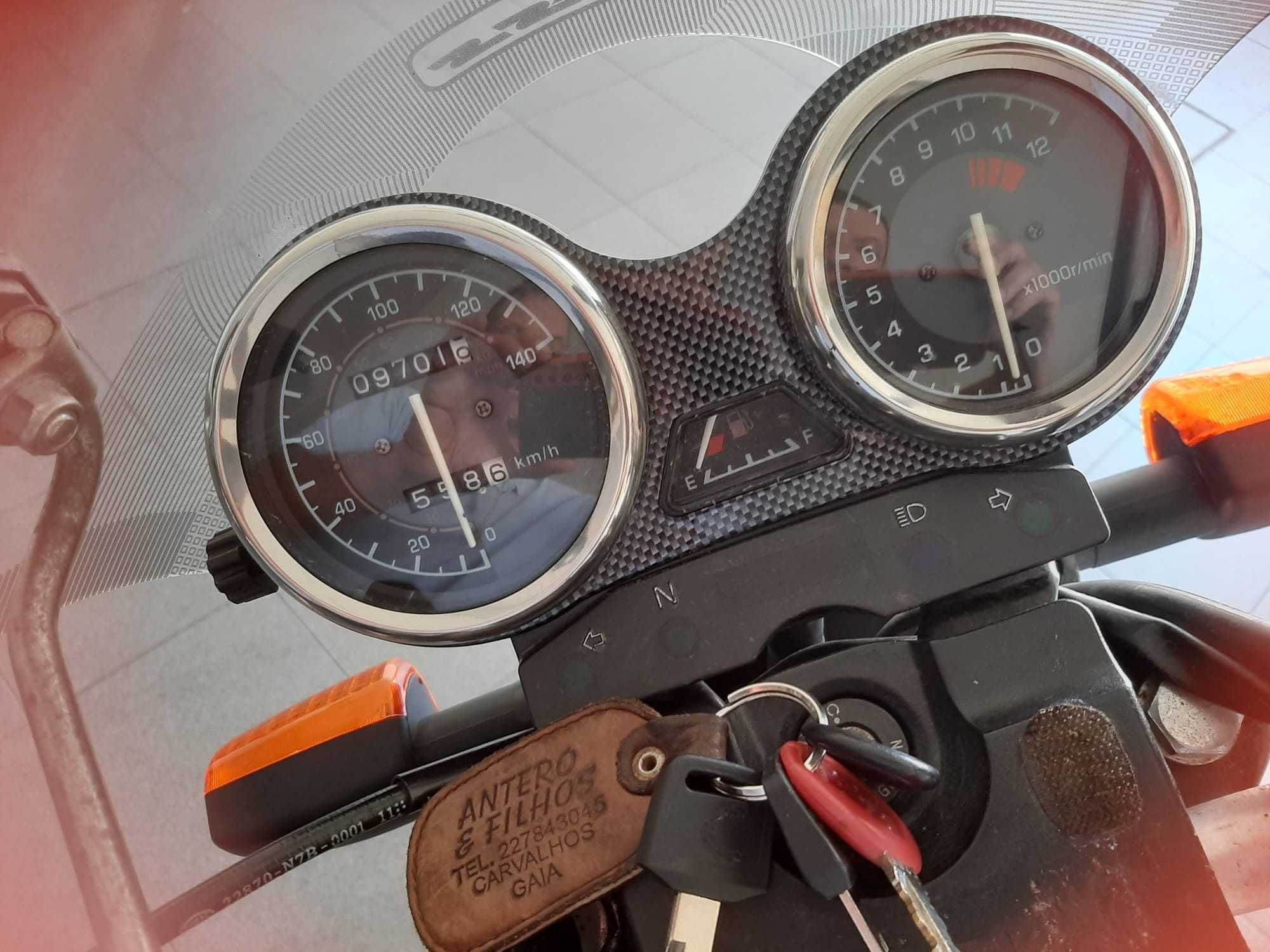 mota 125 Sym em bom estado com  pouco kms