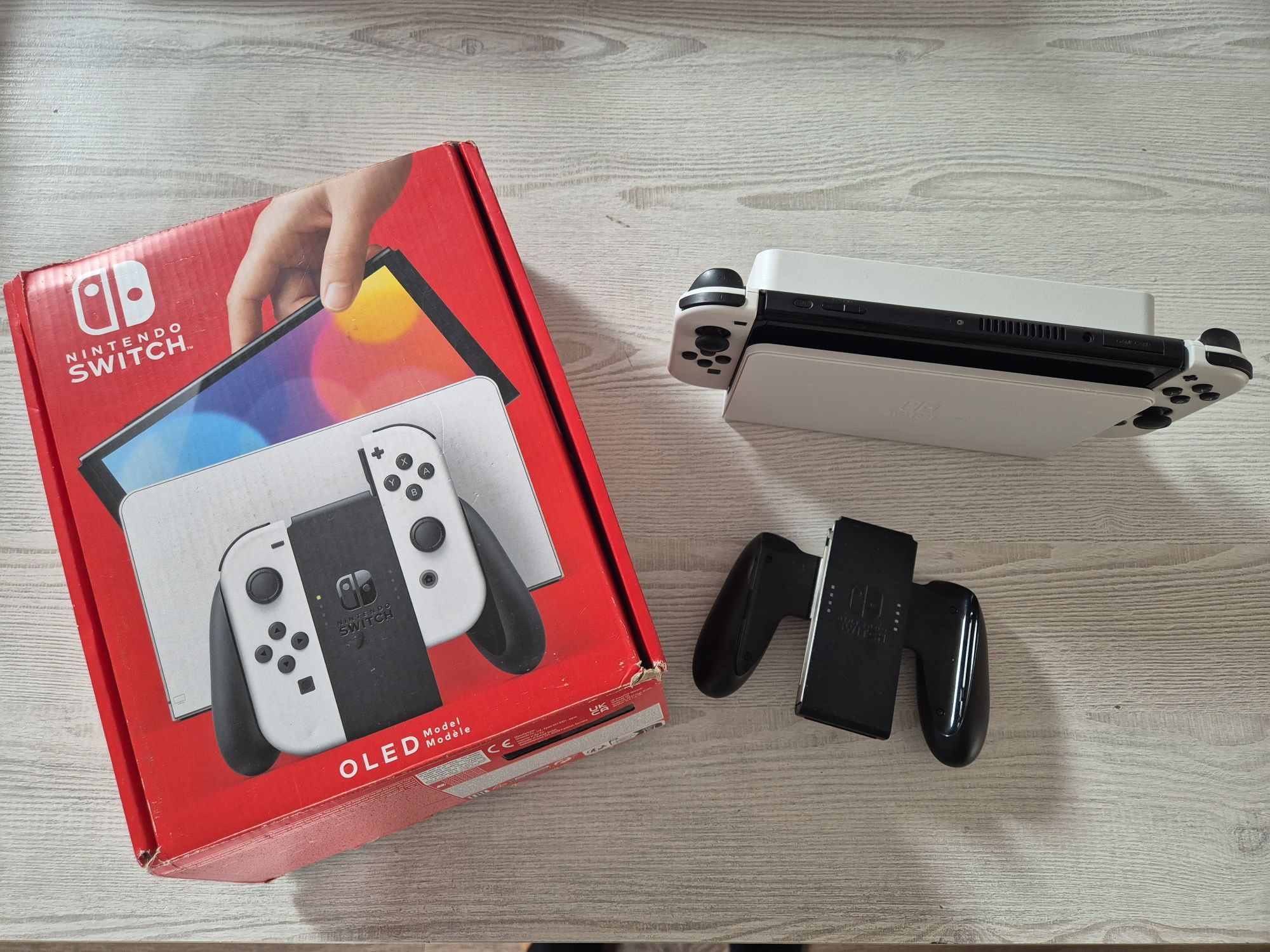 Nintendo Switch Oled + 3 gry Gwarancja