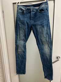 Jeans męskie Solid skinny niebieskie roz szer 44cm dług  109cm 32/34