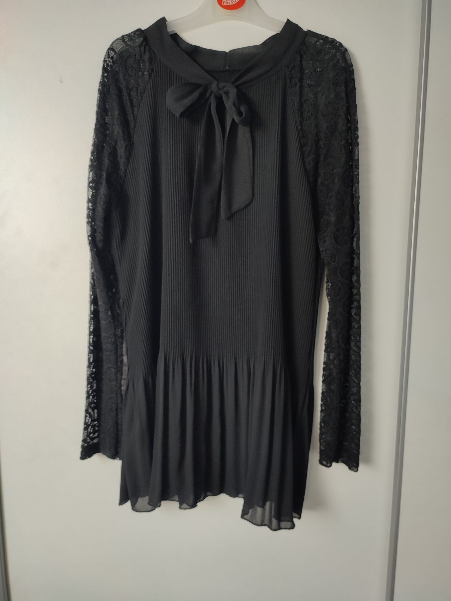 Bluzka 38 M elegancka damska plisowana czarna kokardą falbana baskinka