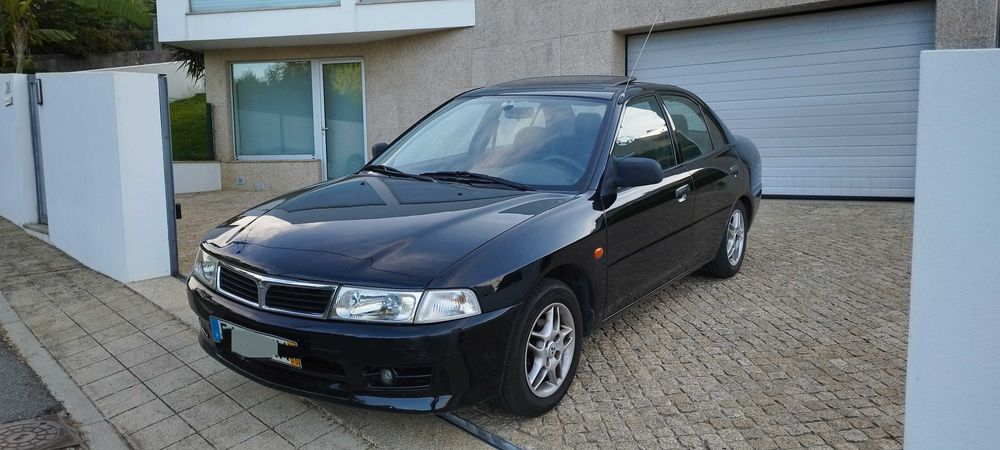 Mitsubishi Lancer 1.3 GLX - A/C e TA