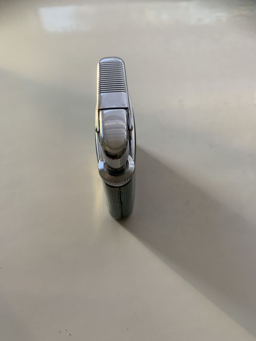 Продам зажигалку