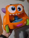 Fisher Price uciekający stworek kręciołek