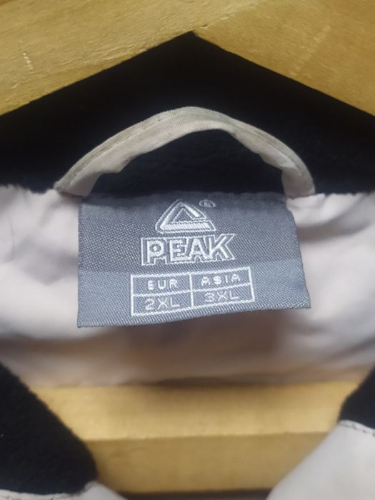 Жіночий пуховик peak