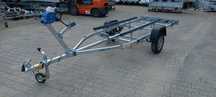 Faro PRZYCZEPA PODŁODZIOWA AQUA, DO 5m Z RESOREM DMC 750 kg, lekka, DOSTAWA!  Do transportu łodzi, pod skuter wodny i ponton