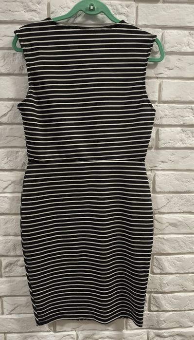 Elegancka ołówkowa sukienka firmy AMISU rozmiar 40