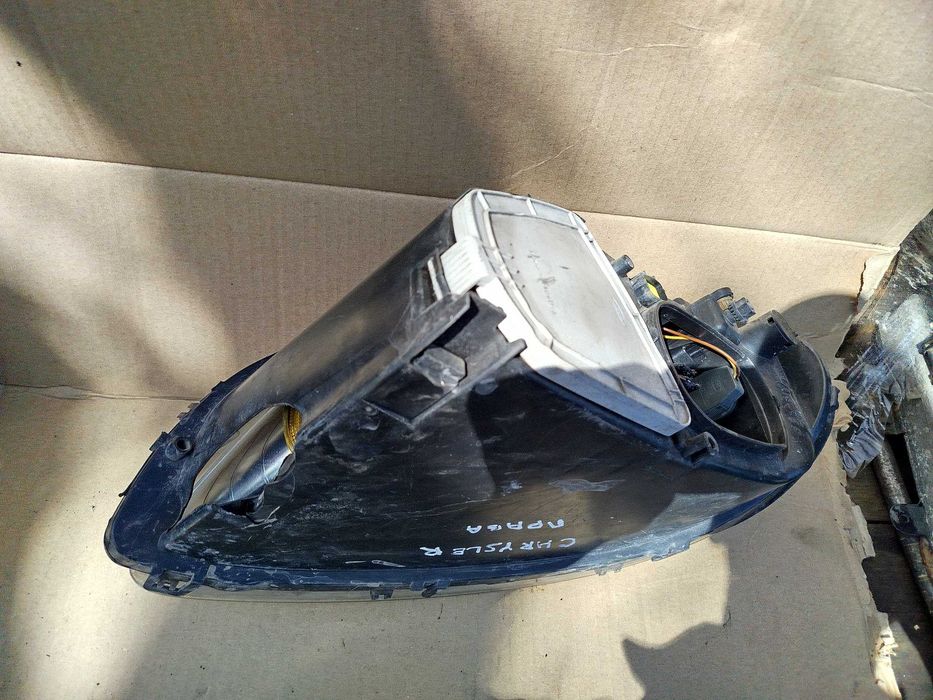 Фари передні Додж Dodge Caravan 4 Chrysler Voyager 4 (2001-2007)