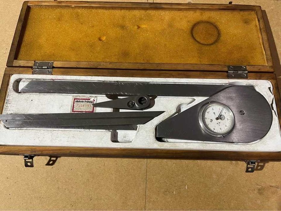 Suta para medição de ângulos com relógio analógico