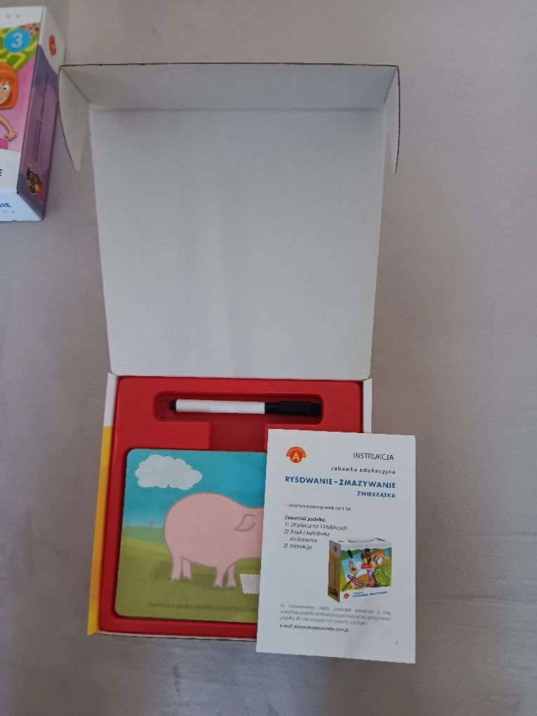 Rysowanie zmazywanie zwierzątka i dziewczynka zabawka edukacyjna