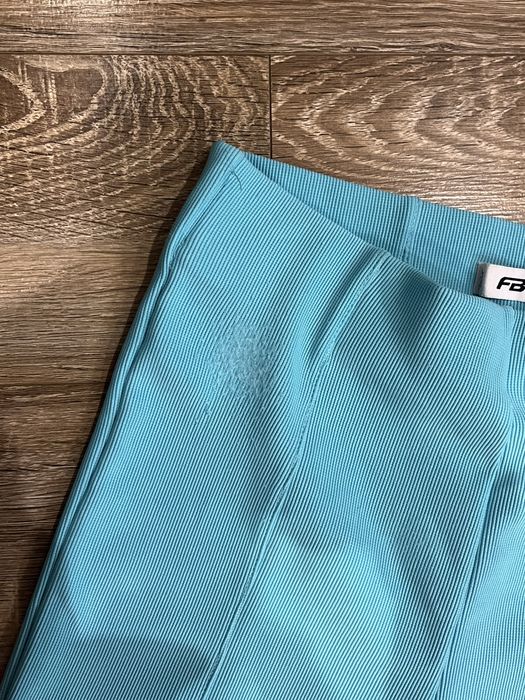 Бірюзові штани кльош