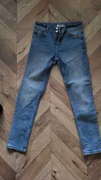 Spodnie damskie jeansowe 38