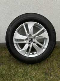 Prawie nowe opony letnie Bridgestone 185/65/15" z alufelgami