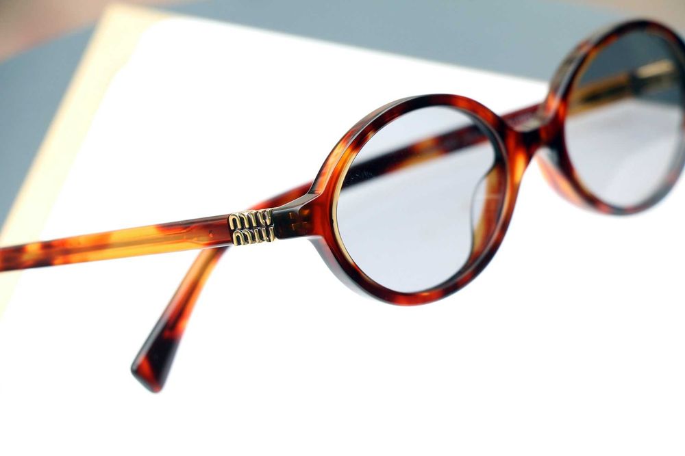 Okulary przeciwsłoneczne  Miu Miu SMU04Z. Bestseller, NOWE.Optyk