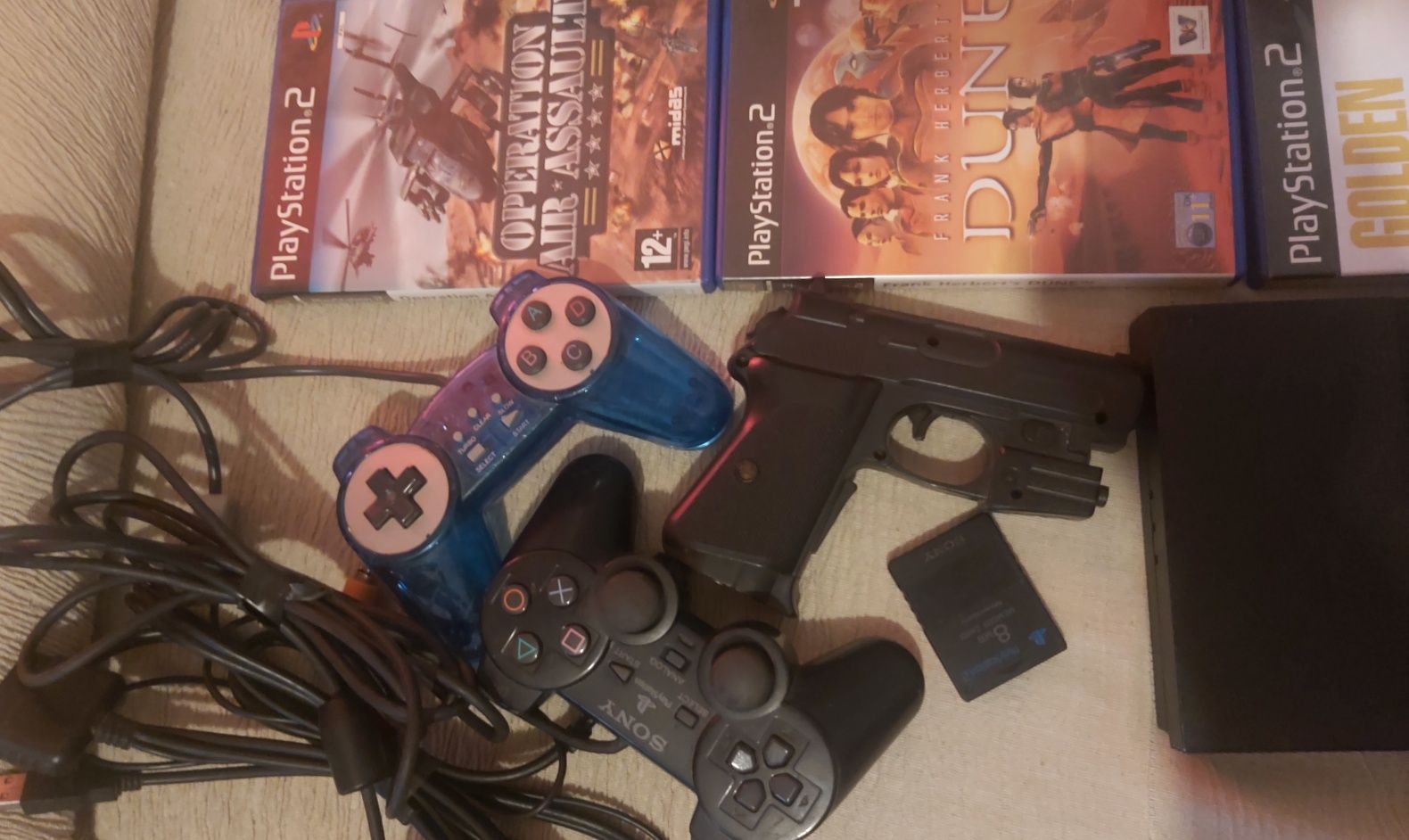 Ps2 com jogos comando cartão de memória pistola e comandos buzz.