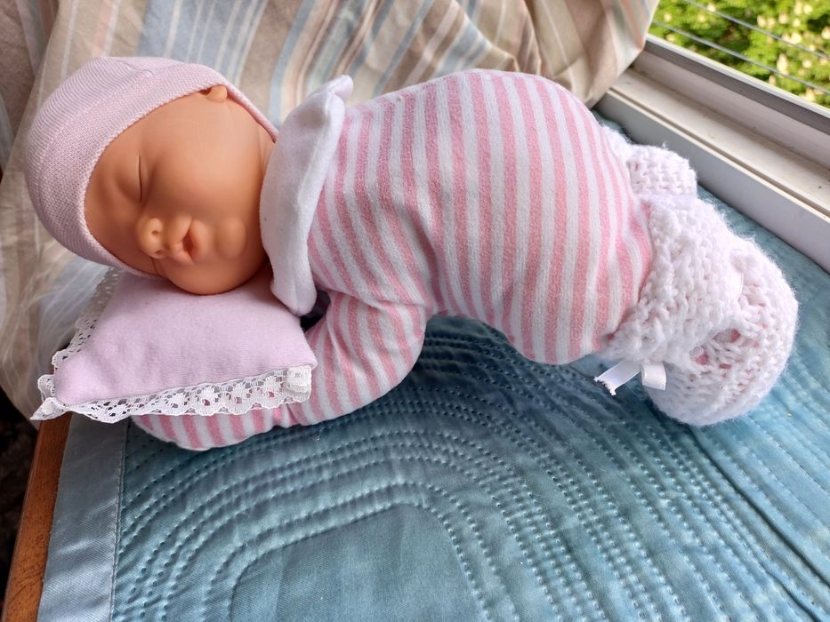 Сплячий музичний пупс