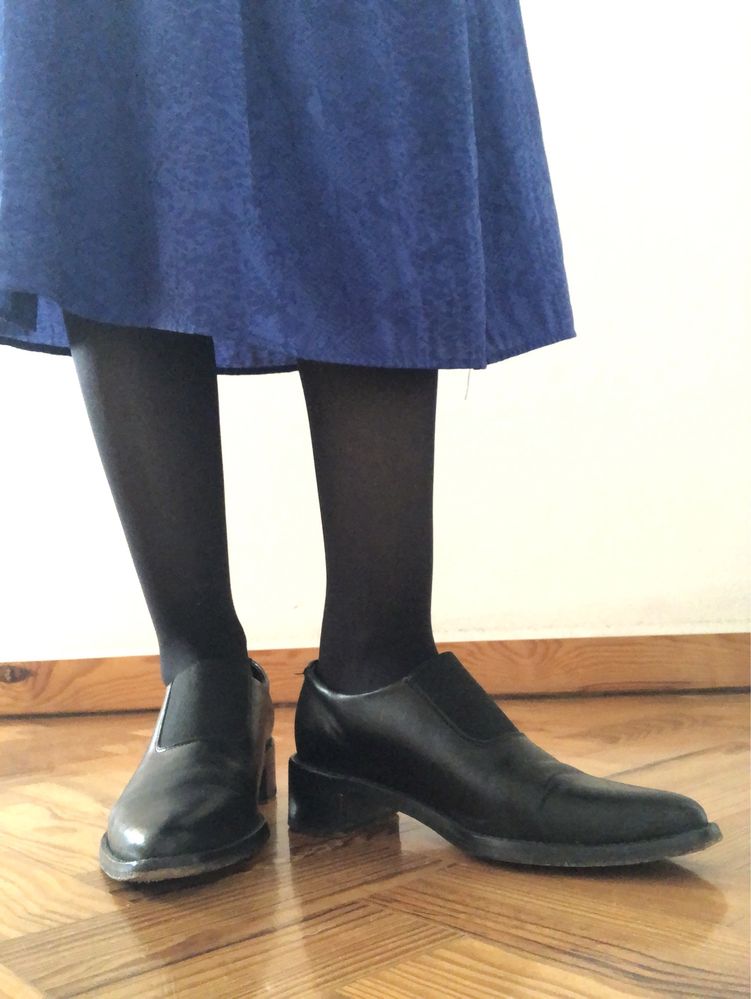 Sapatos pretos da Eureka Shoes