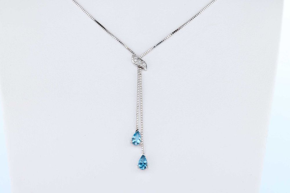 Naszyjnik z białego złota z topazami i diamentami